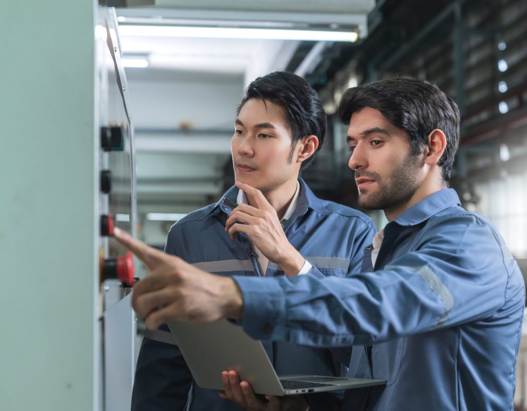 male-asian-caucasian-engineer-professional-having-discussion-standing-consult-machine-factory-two-expert-coworker-brainstorm-explaining-solves-process-cnc-operate-machine Male Asian caucasian engineer professional having a discussion standing consult at machine in the factory ,two expert coworker brainstorm explaining and solves the process of the cnc operate machine