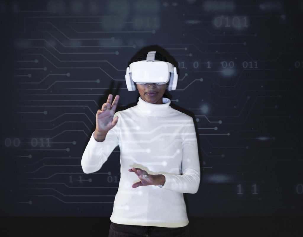 Woman with a virtual reality headset smart technology Woman with a virtual reality headset smart technology